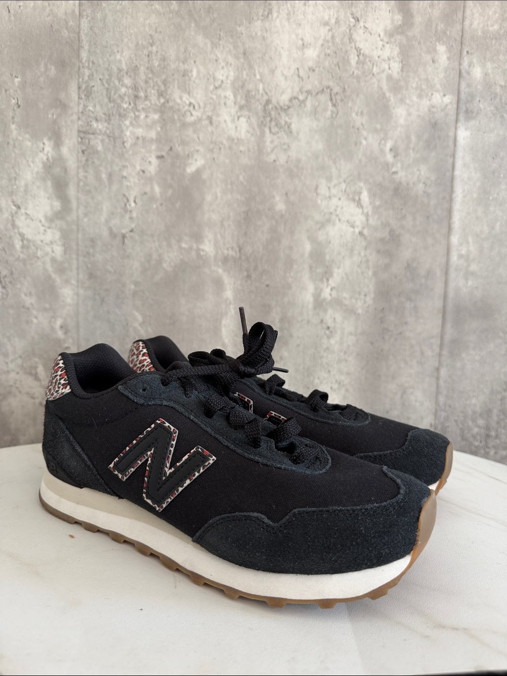 New Balance 5.5 Black Sneakers with leopard Trim 9.5 women’s